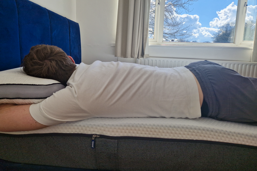 man sleeping on emma premium